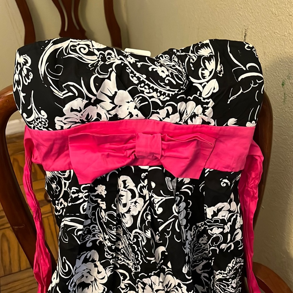 Black and white dress with pink tie and bow zip up dress